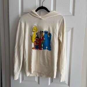 Uniqlo x KAWS Cream and Yellow Sweatshirt